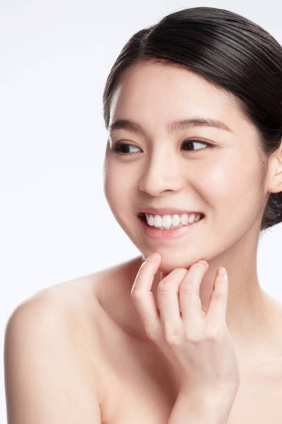 istock Young women wear makeup 1207492862
