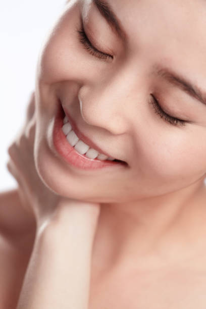 istock Young women wear makeup 1207492875