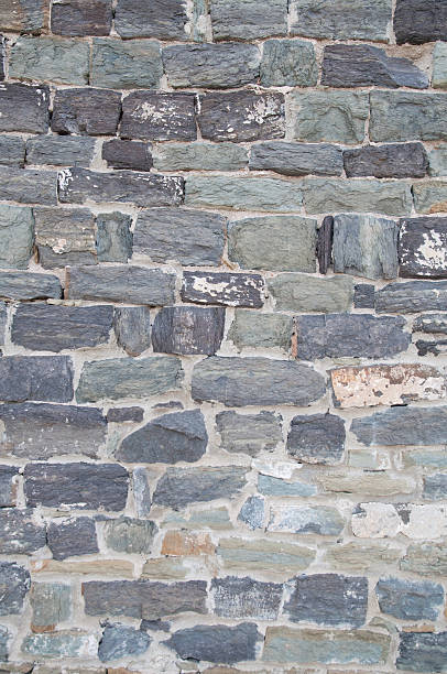 Old stone wall background stock photo