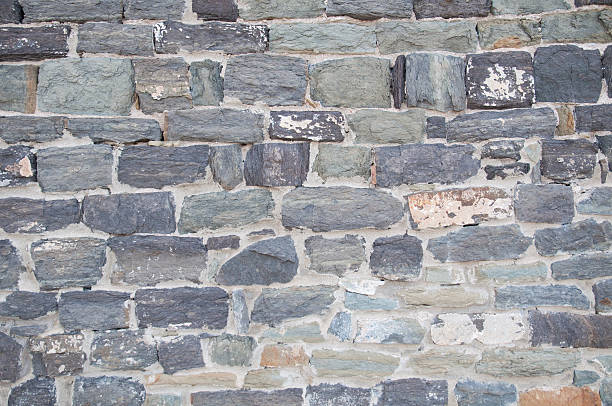 Old stone wall background stock photo