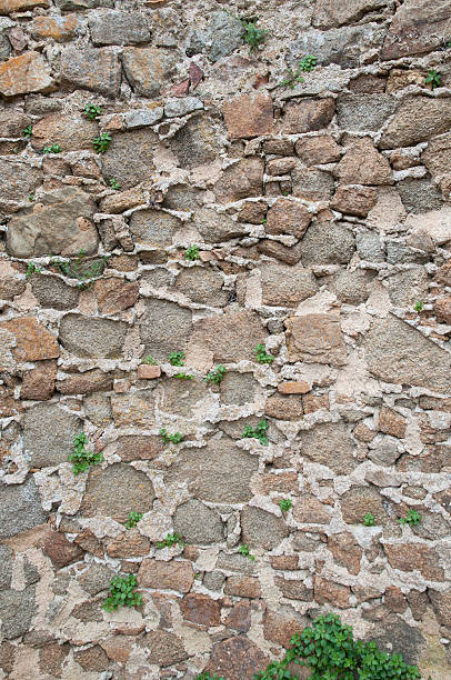 Old stone wall background stock photo