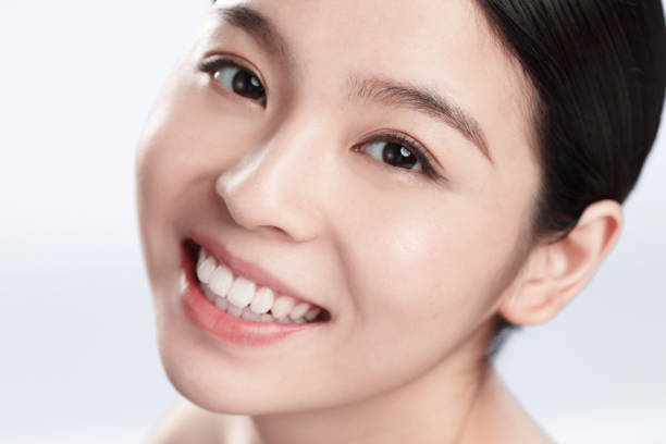 istock Young woman makeup face portrait 1207493400