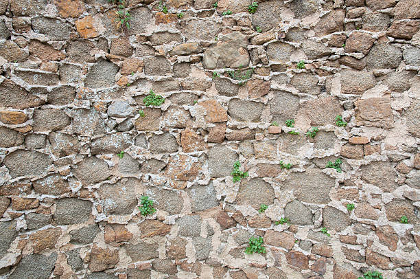 Old stone wall background stock photo