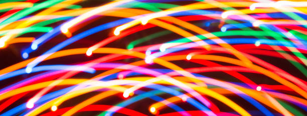 istock Abstract picture of bright colored dynamic lights 1207495163