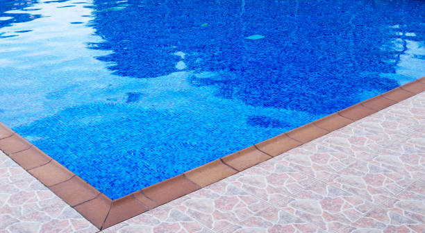 istock Outdoor swimming pool at summer time. 1207496925