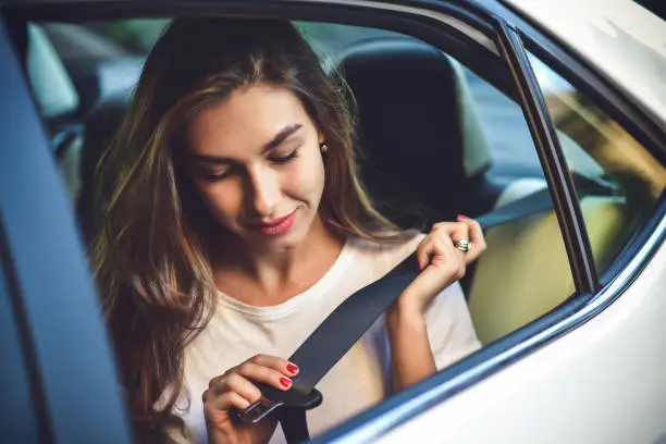 Photo of Attractive woman in car