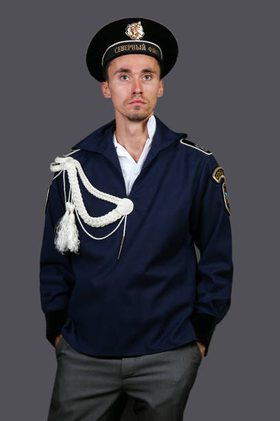 istock Serious Russian sailor in formal uniform looking at camera 1207499395
