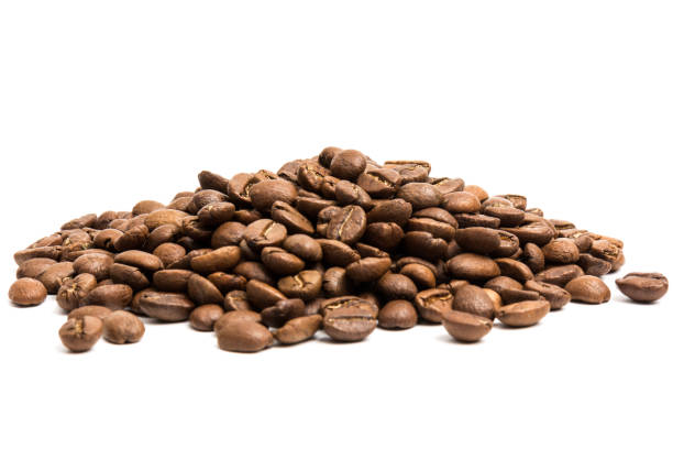 istock Coffee. roasted coffee beans on white background  in close-up 1207499435