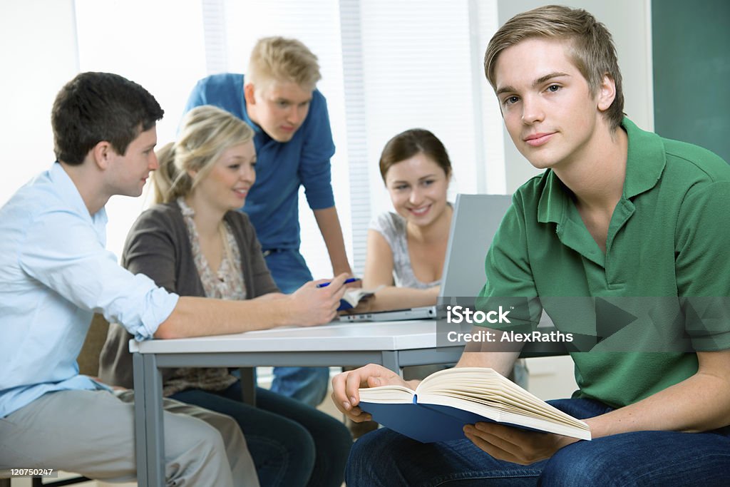 students young students studying together in a classroom 16-17 Years Stock Photo