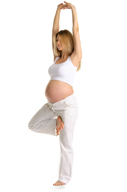 istock Pregnant woman practicing yoga 120750426