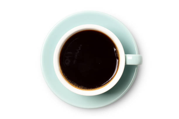 istock coffee cup top view closeup isolated on white background. 1207504964