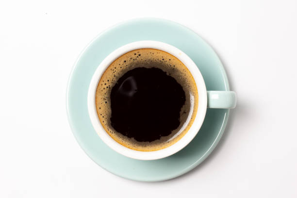 istock coffee cup top view closeup isolated on white background. 1207505016