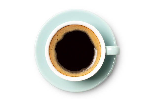 istock coffee cup top view closeup isolated on white background. 1207505069