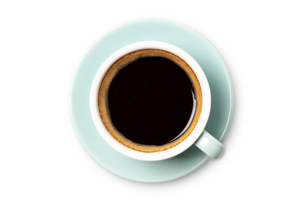 istock coffee cup top view closeup isolated on white background. 1207505104