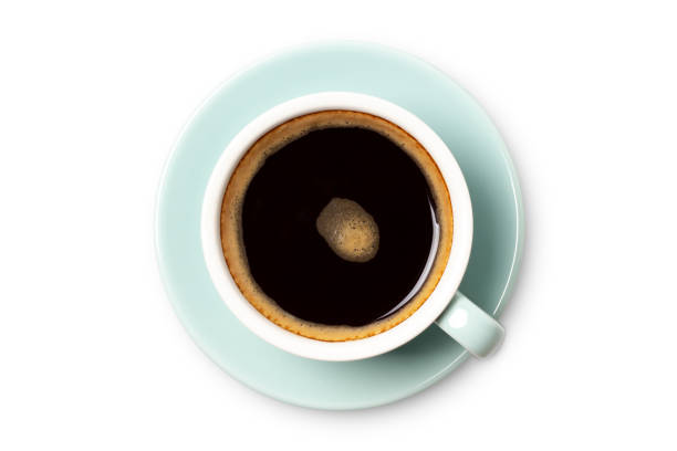 istock coffee cup top view closeup isolated on white background. 1207505124