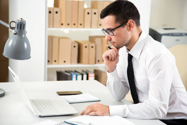 istock Businessman working in an office 1207505481