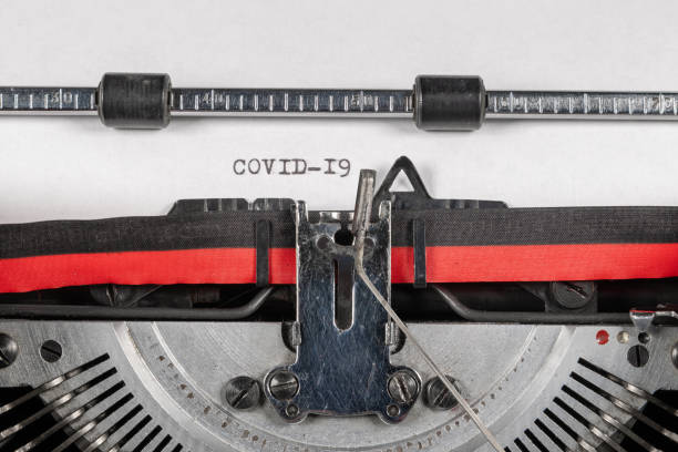 istock COVID-19 typed on a classic typewriter 1207505592