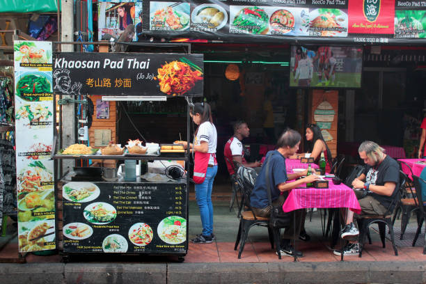 Khao San Road in central Bangkok, Thailand Bangkok, Thailand - December 13, 2019: Khao San Road in central Bangkok, widely known as a world-famous backpacker ghetto with cheap hotels and night markets. khao san road stock pictures, royalty-free photos & images