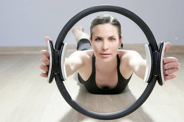 Magic Pilates Ring Woman Aerobics Sport Gym Stock Photo - Download Image  Now - Pilates Ring, Pilates, 30-34 Years - iStock