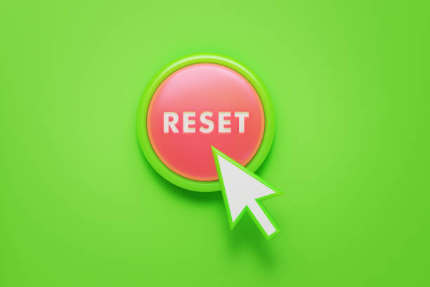 Arrow Shaped Computer Cursor Clicking on A Reset Written Pink Push Button Arrow shaped computer cursor  clicking over a reset written pink push button on green. Horizontal composition with copy space.  Start concept. refresh button on keyboard stock pictures, royalty-free photos & images