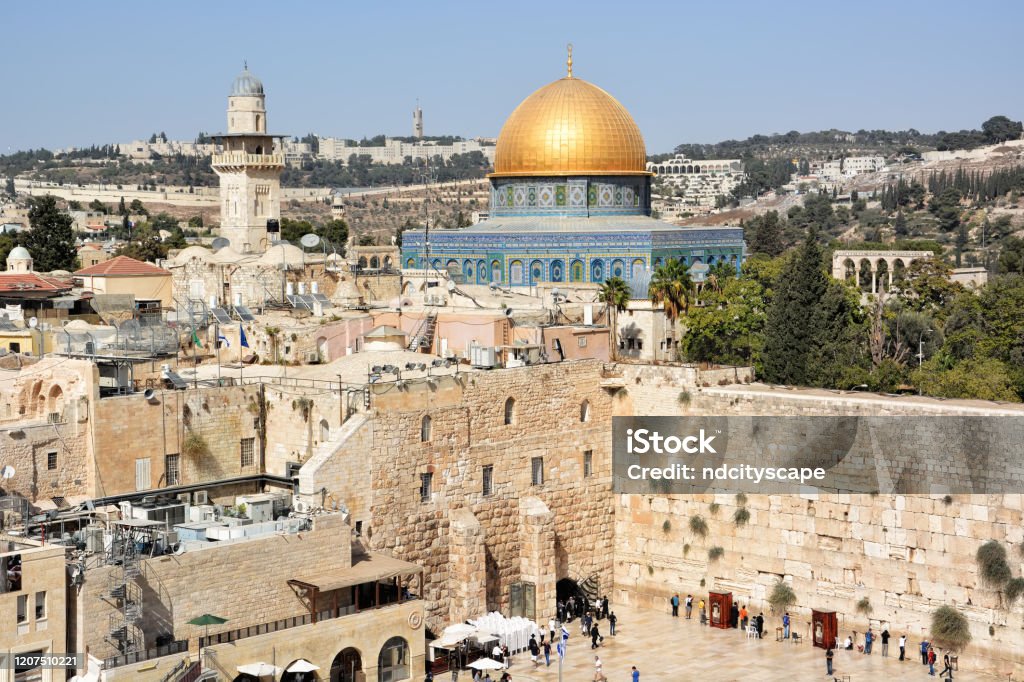 High angle view of historical Western Wall and Dome of the Rock in Jerusalem, Israel Image of Wailing Wall and Dome of the Rock international landmark with blue sky in Old City Jerusalem, Israel Jerusalem Stock Photo