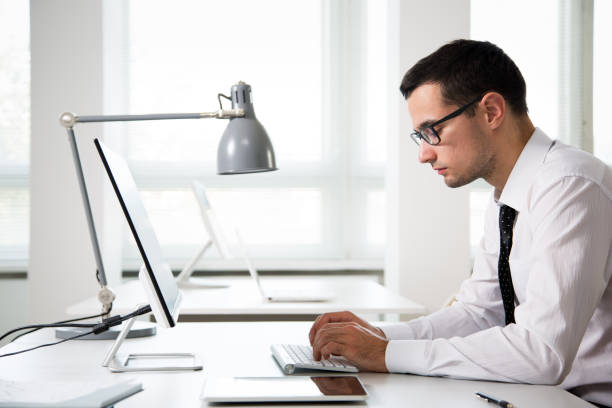 istock Businessman working in an office 1207510372
