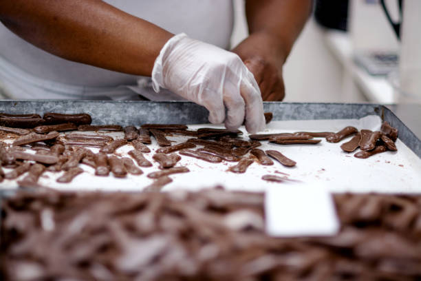 istock Woman preparing chocolate in a factory 1207512545