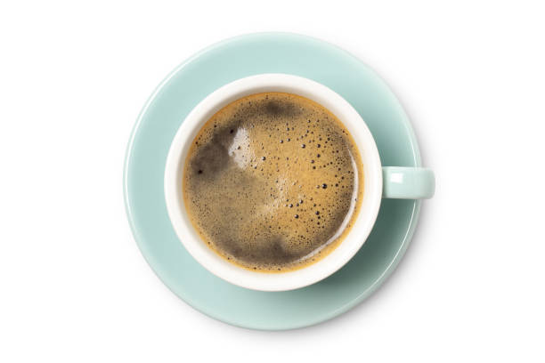 istock coffee cup top view close-up isolated on white background. 1207512606