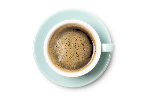 istock coffee cup top view close-up isolated on white background. 1207512702