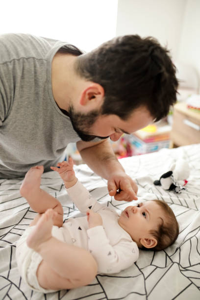 istock Happy father playing with his daughter 1207514037