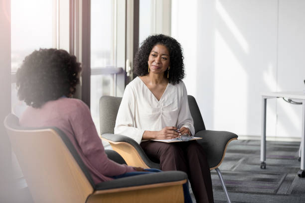 istock Attentive counselor listens to patient 1207514166