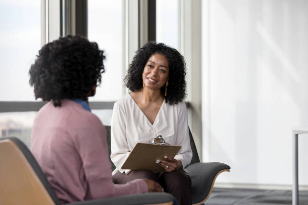 istock Compassionate therapist listening to patient 1207514170