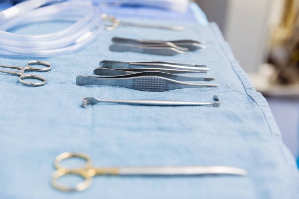istock Close up sterilized surgical instrument lined up for use 1207514281