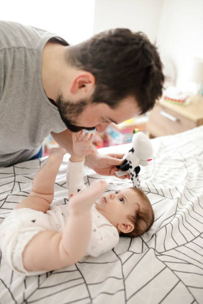 istock Happy father playing with his daughter 1207515374