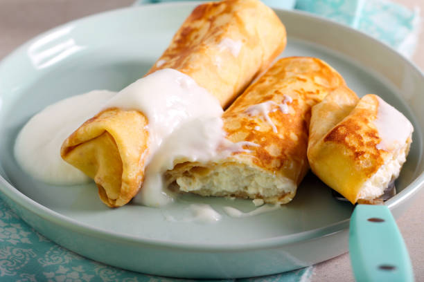 istock Crepe roll with soft cheese filling 1207518878