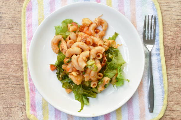 istock stir fried macaroni with chicken and egg dressing ketchup 1207519851
