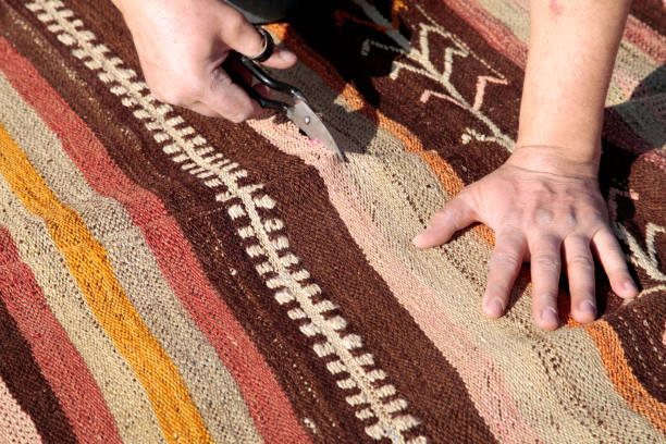 istock Rug repairing process. Antique, decorative rugs. 1207521161