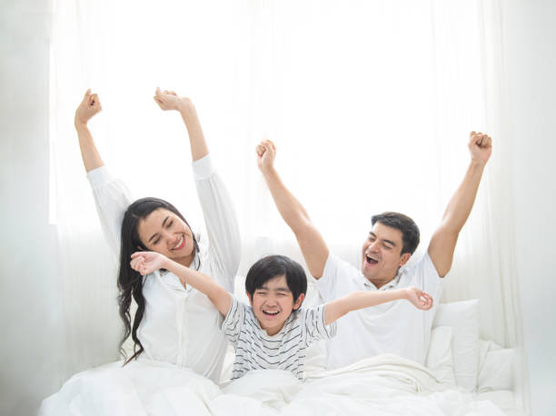 370+ Asian Family Hotel Bed Stock Photos, Pictures & Royalty-Free Images -  iStock