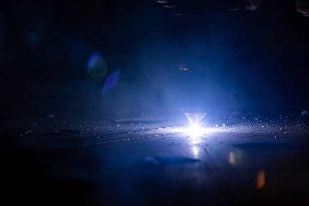 Plasma cutting of metal with a cnc. Plasma cutting machine cutting steel sheet. Laser cutter in production. Industrial metal cutting by plasma laser