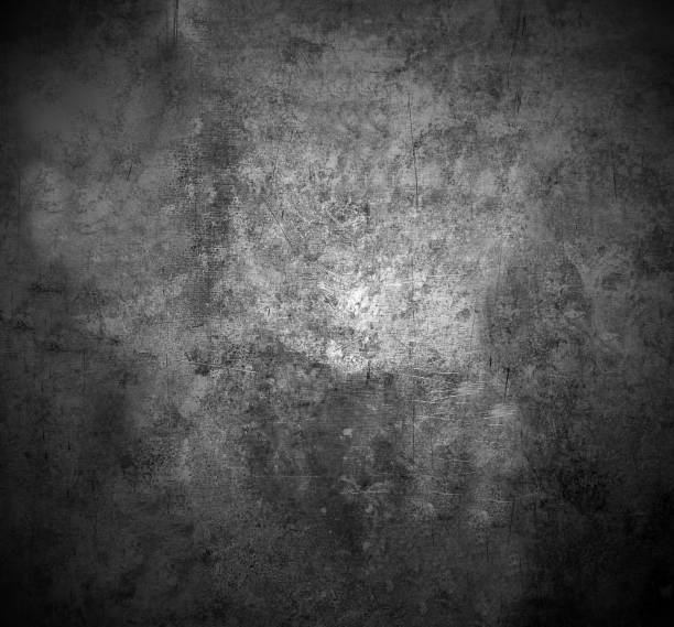 istock The scratched textured surface of the concrete wall is grey . Texture or background. 1207525591