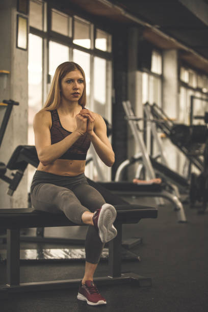 istock Athletic woman focusing in doing a single-leg squat exercise 1207528436