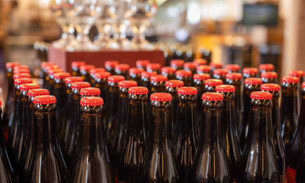 istock Many Belgian beer bottles in abbey shop 1207532346