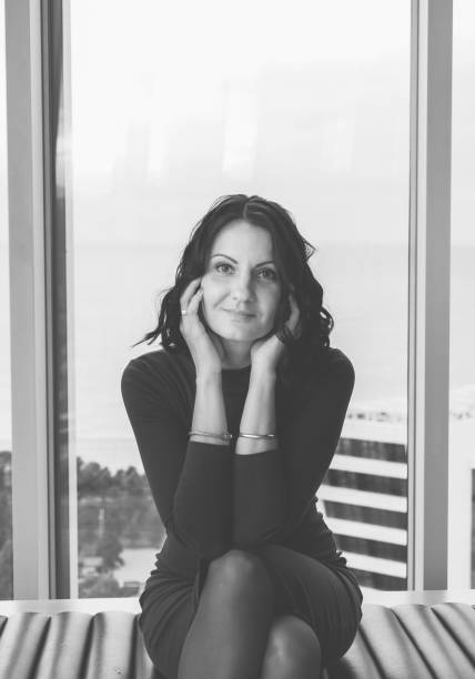 istock Elegant brunette woman inside apartament. 1207537016