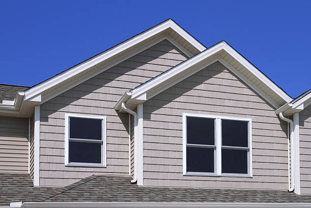 istock Construction Site, new home showing siding, gutters and shingles 120753871