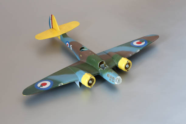 istock Vintage model of aircraft on grey background 1207538925