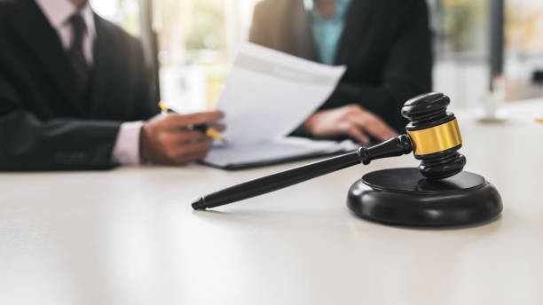 istock Lawyers discuss together at work. 1207539033