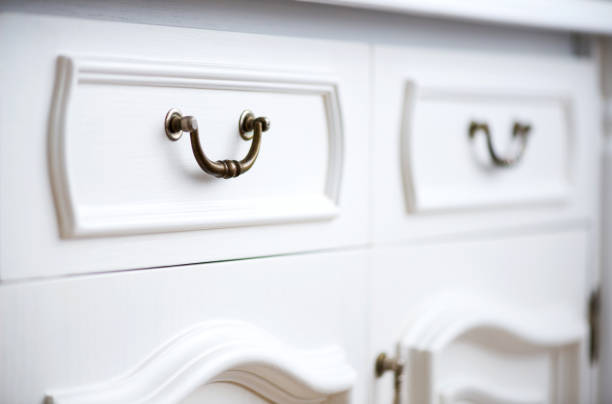 Detail of vintage white cabinet - selective focus, copy space
