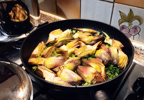 cooking artichokes in a fry pan