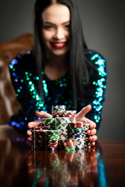 istock Female casino player. 1207547835
