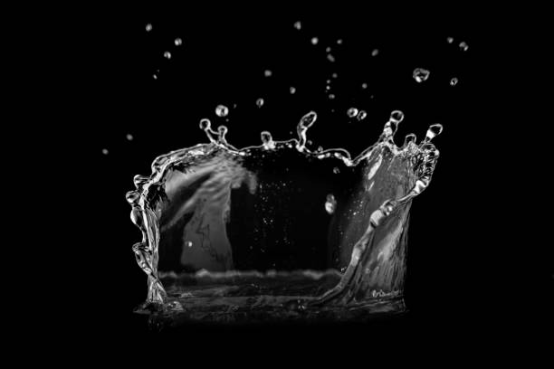 istock Water splash isolated on black background.  Water texture. 1207550583